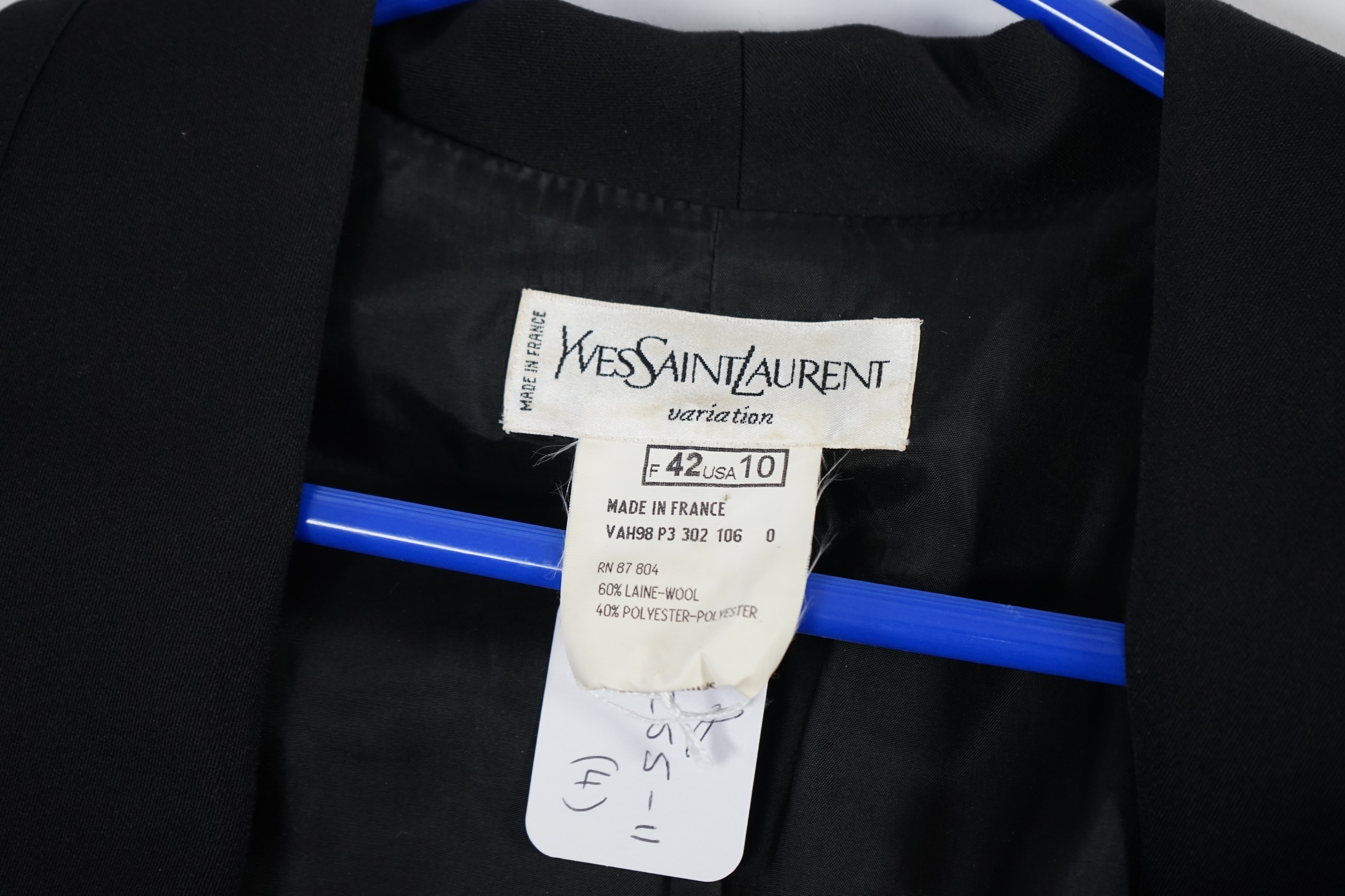 Two vintage Yves Saint Laurent lady's variation black trouser suits, F 42 (UK 14). Please note alterations to make the waist smaller may have been carried out on some of the skirts. Proceeds to Happy Paws Puppy Rescue.